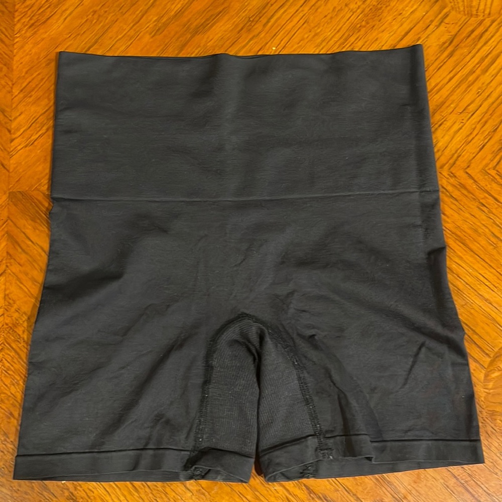 Jockey tight fitting black shorts.